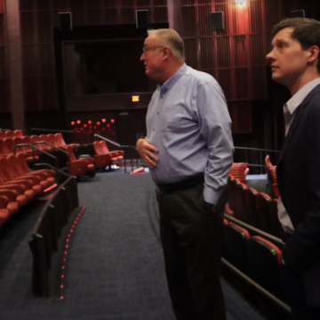 Seattle City Councilmember Andrew J. Lewis and SIFF Executive Director Tom Mara inside the Cinerama Theater