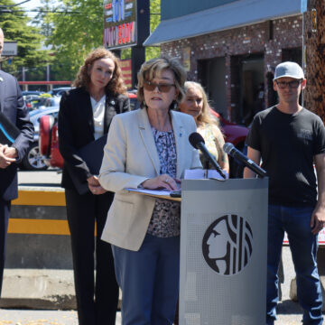 Seattle City Councilmember Cathy Moore at a press conference near Aurora Avenue.