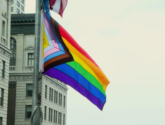 Pride-Flag_City-Hall Pride Flag waving in the sky at City Hall
