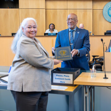 Wing Luke Museum interim Executive Director Kamahanahokulani Farrar Law receiving the "Wing Luke Year in Seattle" proclamation