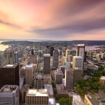 Seattle-Aerial-at-Sunset aerial view over Seattle downtown and beyond at sunset