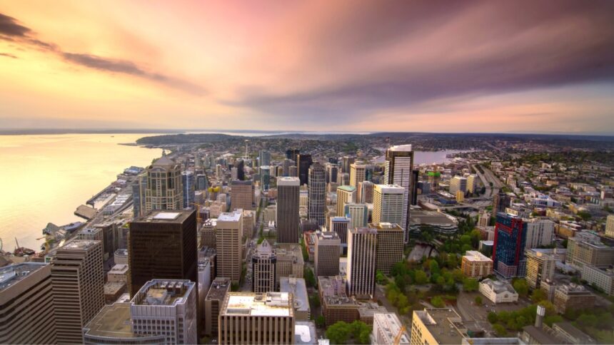 Seattle-Aerial-at-Sunset aerial view over Seattle downtown and beyond at sunset
