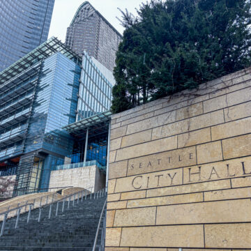 Front view of Seattle City Hall on a rainy, cloudy day