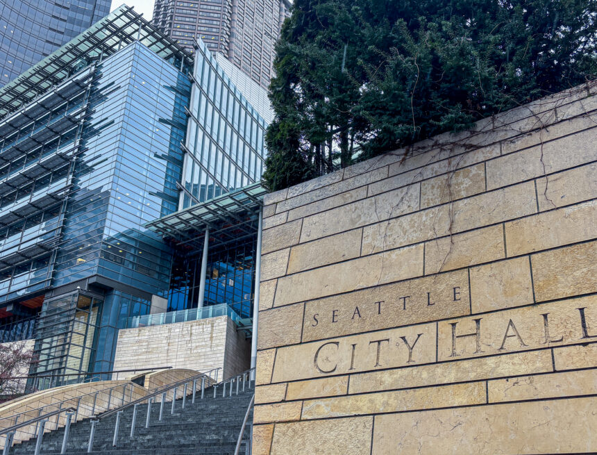 Front view of Seattle City Hall on a rainy, cloudy day