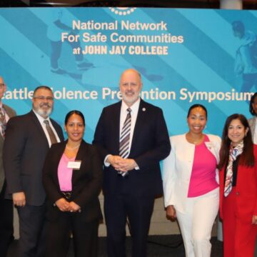group photo of officials at the Seattle Violence Prevention Symposium